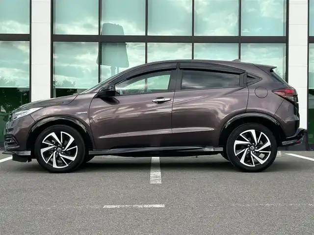 ホンダ ヴェゼル ハイブリッド RS ホンダセンシング 和歌山県 2019(平31)年 5.2万km オーロラアメジストメタリック 純正ナビ/フルセグTV/バックカメラ/HDMI/衝突軽減ブレーキ/アダプティブクルーズコントロール/純正ビルトインETC/ドライブレコーダー/シートヒーター/ハーフレザーシート/純正アルミホイール/LEDヘッドライト/オートライト