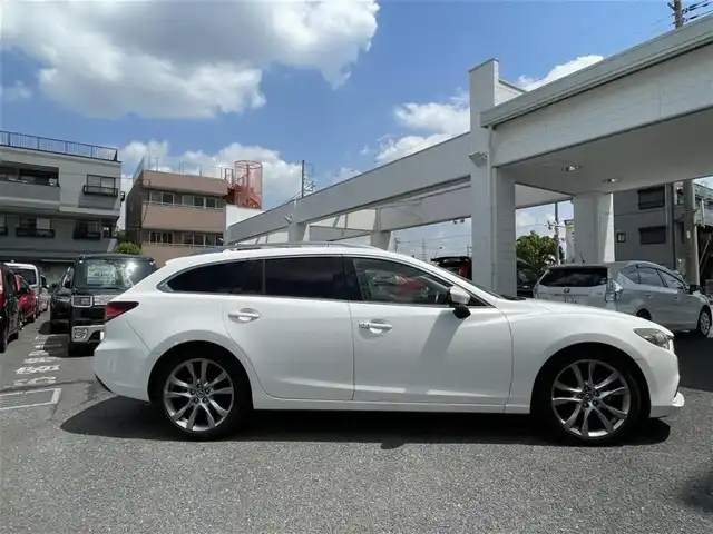 マツダ アテンザ ワゴン 25S Lパッケージ 埼玉県 2013(平25)年 11.3万km スノーフレイクホワイトパールマイカ (株)IDOMが運営する【じしゃロン鳩ヶ谷店】の自社ローン専用車両になりますこちらは現金またはオートローンご利用時の価格です。自社ローンご希望の方は別途その旨お申付け下さい/スマートシティブレーキサポート/レーダークルーズコントロール/レーンキープアシスト/純正メモリーナビ/フルセグＴＶ/バックカメラ/ＥＴＣ/前後ドライブレコーダー/黒革シート/電動シート/シートヒーター/ＨＩＤヘッドライト