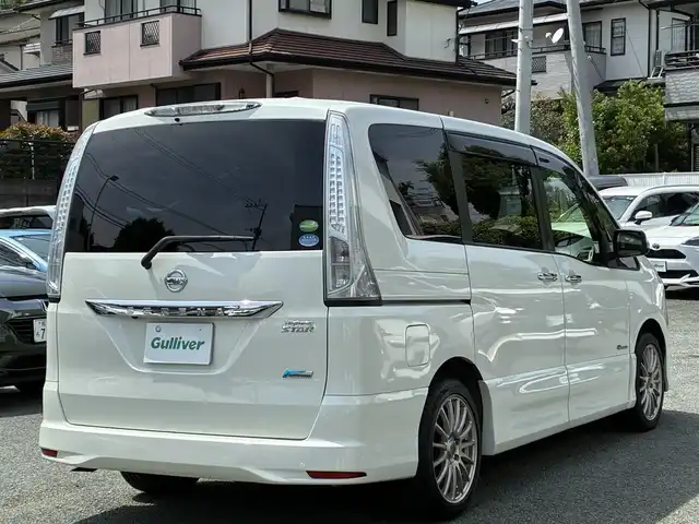 日産 セレナ ハイウェイスター Sハイブリッド 熊本県 2013(平25)年 8.9万km ブリリアントホワイトパール 純正SDナビ(MC313D-W)/【フルセグTV/SD/CD/DVD/Bluetooth】/バックカメラ/ALPINEフリップダウンモニター/片側パワースライドドア/クルーズコントロール/社外17インチアルミホイール/Clazzio革調シートカバー/オートライト/ETC/横滑り防止装置/盗難防止装置/純正フロアマット/プッシュスタート/スマートキー/スペアキー/三列シート/ウォークスルー/取扱説明書/保証書