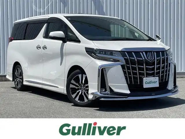 トヨタ アルファード S Cパッケージ 福岡県 2021(令3)年 4.2万km ホワイトパールクリスタルシャイン モデリスタエアロ(F.S.R)/ツインムーンルーフ/純正フリップダウンモニター/純正ＤＡナビ/CD/DVD/BT/バックカメラ/黒革シート/ＰＣＳ/LTA/ＢＳＭ/レーダークルーズコントロール/ビルトインETC/両側パワースライドドア/パワーバックドア/デジタルインナーミラー/シートメモリー/前席パワーシート/前席シートヒーター/ベンチレーション/オットマン/三眼LED/オートハイビーム/AC100V/電動パーキング/ブレーキホールド/スマートキー/プッシュスタート
