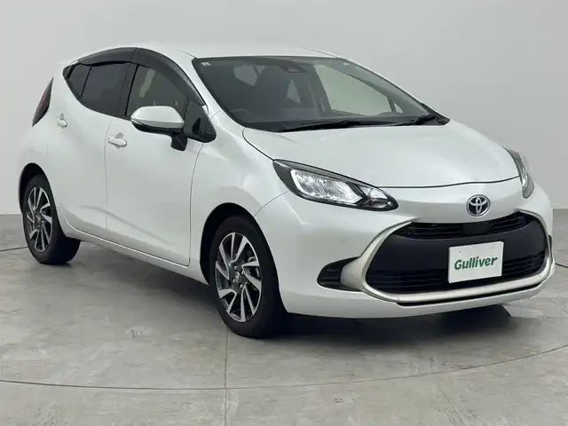 トヨタ アクア G 愛知県 2021(令3)年 6.7万km プラチナホワイトパールマイカ 純正7インチディスプレイオーディオ/　　・Bluetooth対応/USBポート/バックカメラ/ビルトインETC/本革巻ステアリングリモコン/ステアリングヒーター/ハーフレザーシート/パワーシート（D席）/シートヒーター（前席）/純正16インチアルミホイール/LEDヘッドライト/電動格納ウィンカーミラー/トヨタセーフティセンス/　　・プリクラッシュセーフティ/　　・レーンディバーチャーアラート/　　・レーントレーシングアシスト/　　・レーダークルーズコントロール/　　・ロードサインアシスト/　　・オートマチックハイビーム/クリアランスソナー/スマートキー