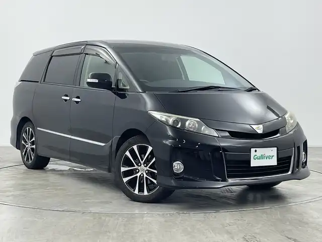 トヨタ エスティマ アエラス プレミアムエディション 群馬県 2014(平26)年 9.6万km ブラック ９型ナビ　バックカメラ　フルセグＴＶ　両側電動スライドドア　オートライト　ＨＩＤヘッドライト　フォグライト　横滑り防止装置　パワーシート　ＥＴＣ　純正１８インチアルミホイール　オットマン　スマートキー