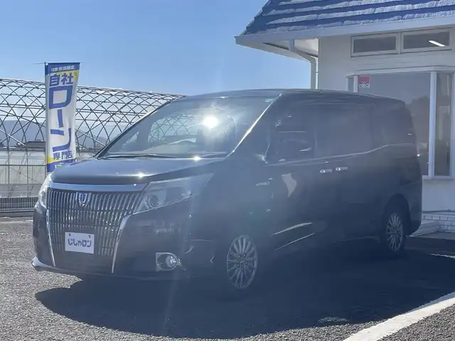 トヨタ エスクァイア ハイブリッド Xi 徳島県 2015(平27)年 13.2万km ブラック (株)IDOMが運営する【じしゃロン徳島店】の自社ローン専用車両になりますこちらは現金またはオートローンご利用時の価格です。/ナビ　/バックカメラ/フリップダウンモニター/フルセグTV/ETC/Ｂｌｕｅｔｏｏｔｈ接続/両側パワースライドドア