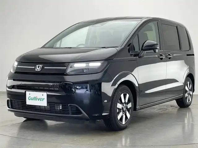 ホンダ フリード ハイブリット e:HEV AIR EX 愛知県 2024(令6)年 0.1千km クリスタルブラックパール 登録済未使用/ホンダセンシング/両側パワースライドドア/レーダークルーズコントロール/純正アルミホイール/ブラインドスポットモニター/シートヒーター/衝突被害軽減ブレーキ/LEDオートライト/コーナーセンサー/カーテンエアバック/USB/ハーフレザーシート/電子パーキング/禁煙車