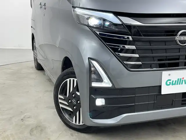 日産 ルークス HWS X プロパイロットED 新潟県 2023(令5)年 6.3万km チタニウムグレーメタリック 純正後付けナビ MJ122D-W/（BT/FM/AM/フルセグTV）/全周囲カメラ(ディスプレイ付自動防眩式ルームミラー)/ハンズフリーオートスライドドア/両側電動スライドドア/D/N席シートヒーター/ステアリングヒーター/追従式クルーズコントロール/前後コーナーセンサー/LEDヘッドライト/アイドリングストップ/ステアリングヒーター/オートライト/純正フロアマット/プロパイロット/エマージェンシーブレーキ/オートブレーキホールド/プッシュスタート