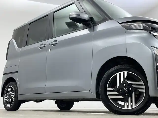 日産 ルークス HWS X プロパイロットED 新潟県 2023(令5)年 6.3万km チタニウムグレーメタリック 純正後付けナビ MJ122D-W/（BT/FM/AM/フルセグTV）/全周囲カメラ(ディスプレイ付自動防眩式ルームミラー)/ハンズフリーオートスライドドア/両側電動スライドドア/D/N席シートヒーター/ステアリングヒーター/追従式クルーズコントロール/前後コーナーセンサー/LEDヘッドライト/アイドリングストップ/ステアリングヒーター/オートライト/純正フロアマット/プロパイロット/エマージェンシーブレーキ/オートブレーキホールド/プッシュスタート