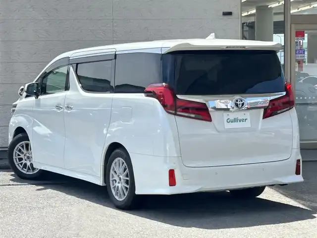 トヨタ アルファード S Cパッケージ 兵庫県 2019(令1)年 3.6万km ホワイトパールクリスタルシャイン アルパイン11インチメモリーナビ/（CD/DVD/BT/フルセグTV）/バックカメラ/12.8インチフリップダウンモニター/両側パワースライドドア/パワーバックドア/ハンドルヒーター/衝突軽減ブレーキ/レーンキーピングサポート/レーダークルーズコントロール/1列目/2列目パワーシート/前席シートヒーター/ベンチレーション/ETC/取扱説明書