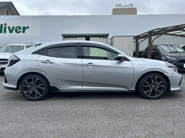 ホンダ シビック ハッチバック 福島県 2019(令1)年 3.3万km ルナシルバーM ワンオーナー/純正ナビ/CD/DVD/SD/BT/USB/フルセグTV/ホンダセンシング/革コンビシート(プライムスムースＸファブリック)/シートヒーター/パワーシート/レーダークルーズコントロール/ステアリングリモコン/アイドリングストップ/バックカメラ/ビルトインETC 2.0/ドライブレコーダー/プッシュスタート/ドアバイザー/純正フロアマット/オートライト/LEDヘッドライト/フォグライト