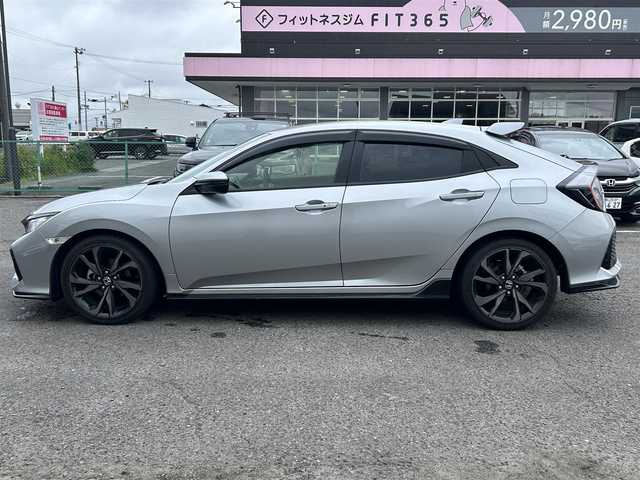 ホンダ シビック ハッチバック 福島県 2019(令1)年 3.3万km ルナシルバーM ワンオーナー/純正ナビ/CD/DVD/SD/BT/USB/フルセグTV/ホンダセンシング/革コンビシート(プライムスムースＸファブリック)/シートヒーター/パワーシート/レーダークルーズコントロール/ステアリングリモコン/アイドリングストップ/バックカメラ/ビルトインETC 2.0/ドライブレコーダー/プッシュスタート/ドアバイザー/純正フロアマット/オートライト/LEDヘッドライト/フォグライト