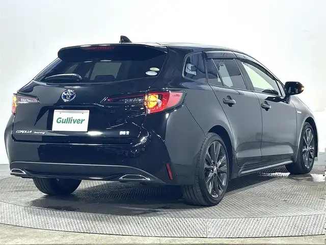 トヨタ カローラツーリング ハイブリッド ダブルバイビー 大阪府 2020(令2)年 2.7万km ブラックマイカ ディプレイオーディオ（ナビ有／ＣＤ／ＤＶＤ／Ｂｌｕｅｔｏｏｔｈ）　ＢＳＭ　衝突軽減　レーンアシアスト　レーダークルーズ　バックカメラ　オートホールド　クリアランスソナー　ビルトインＥＴＣ　ドラレコ