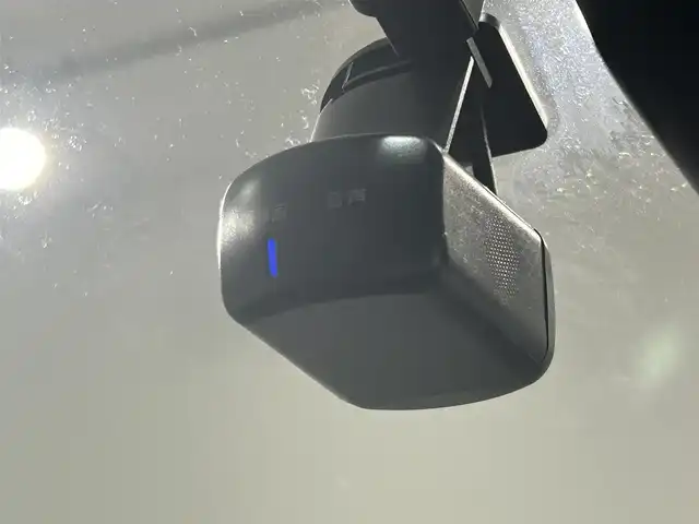 日産 オーラ G 愛知県 2023(令5)年 0.6万km ガーネットレッド/スーパーブラック 2トーン 純正９インチディスプレイナビ　/（Bluetooth/フルセグTV/CarPlay/USB/HDMI/AM/FM)/ＢＯＳＥサウンド　/プロパイロット　/ワイヤレス充電　/ＳＯＳコール　/アラウンドビューモニター　/エマージェンシーブレーキ　/ビルトインＥＴＣ２．０　/ドライブレコーダー　/デジタルインナーミラー　/ＬＥＤヘッドライト/LEDフォグランプ/ブラインドスポットモニター（BSW)/コーナーセンサー/車線逸脱警報/ハンドル支援/純正フロアマット