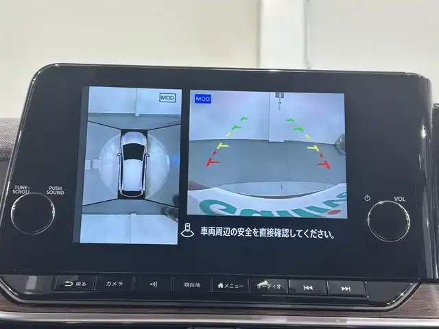 日産 オーラ G 愛知県 2023(令5)年 0.6万km ガーネットレッド/スーパーブラック 2トーン 純正９インチディスプレイナビ　/（Bluetooth/フルセグTV/CarPlay/USB/HDMI/AM/FM)/ＢＯＳＥサウンド　/プロパイロット　/ワイヤレス充電　/ＳＯＳコール　/アラウンドビューモニター　/エマージェンシーブレーキ　/ビルトインＥＴＣ２．０　/ドライブレコーダー　/デジタルインナーミラー　/ＬＥＤヘッドライト/LEDフォグランプ/ブラインドスポットモニター（BSW)/コーナーセンサー/車線逸脱警報/ハンドル支援/純正フロアマット