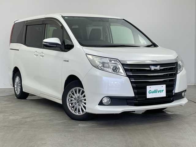 トヨタ ノア ハイブリッド G 新潟県 2014(平26)年 9万km ホワイトパールクリスタルシャイン 純正メモリナビ【NSZT-Y64T】/　フルセグTV/Bluetooth/CD/DVD/フリップダウンモニター/クルーズコントロール/両側パワースライドドア/前席シートヒーター/前後ドライブレコーダー/バックモニター/ビルトインETC/レザー調シートカバー/レザーステアリング/ステアリングスイッチ/横滑り防止装置/オートライト