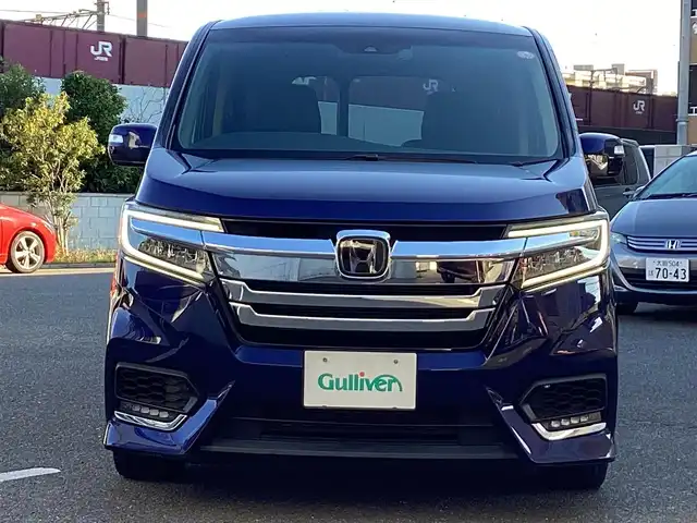 ホンダ ステップワゴン スパーダ eHEV G EXホンダS 大阪府 2021(令3)年 6.2万km 紺 ワンオーナー/純正10インチインターナビ・フルセグTV・CD・/　　　DVD・Bluetooth・HDMI・USB・SD/純正フリップダウンモニター/両側パワースライドドア/純正ドライブレコーダー/ホンダセンシング/スマートキー/バックカメラ/わくわくゲート/ビルトインETC2.0/前席シートヒーター/LEDフォグランプ/LEDオートヘッドライト/電動パーキングブレーキ/電動格納ウインカーミラー/コンフォートビューパッケージ/純正16インチアルミホイール/R4.5.6.7年ディーラー点検記録簿有