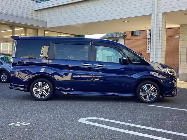 ホンダ ステップワゴン スパーダ eHEV G EXホンダS 大阪府 2021(令3)年 6.2万km 紺 ワンオーナー/純正10インチインターナビ・フルセグTV・CD・/　　　DVD・Bluetooth・HDMI・USB・SD/純正フリップダウンモニター/両側パワースライドドア/純正ドライブレコーダー/ホンダセンシング/スマートキー/バックカメラ/わくわくゲート/ビルトインETC2.0/前席シートヒーター/LEDフォグランプ/LEDオートヘッドライト/電動パーキングブレーキ/電動格納ウインカーミラー/コンフォートビューパッケージ/純正16インチアルミホイール/R4.5.6.7年ディーラー点検記録簿有