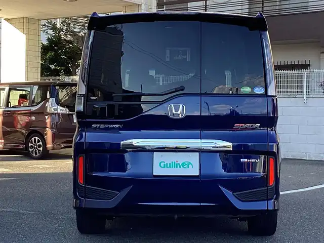 ホンダ ステップワゴン スパーダ eHEV G EXホンダS 大阪府 2021(令3)年 6.2万km 紺 ワンオーナー/純正10インチインターナビ・フルセグTV・CD・/　　　DVD・Bluetooth・HDMI・USB・SD/純正フリップダウンモニター/両側パワースライドドア/純正ドライブレコーダー/ホンダセンシング/スマートキー/バックカメラ/わくわくゲート/ビルトインETC2.0/前席シートヒーター/LEDフォグランプ/LEDオートヘッドライト/電動パーキングブレーキ/電動格納ウインカーミラー/コンフォートビューパッケージ/純正16インチアルミホイール/R4.5.6.7年ディーラー点検記録簿有