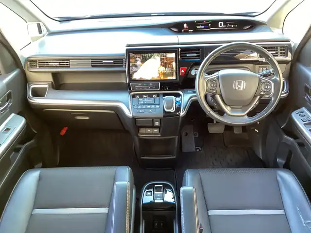 ホンダ ステップワゴン スパーダ eHEV G EXホンダS 大阪府 2021(令3)年 6.2万km 紺 ワンオーナー/純正10インチインターナビ・フルセグTV・CD・/　　　DVD・Bluetooth・HDMI・USB・SD/純正フリップダウンモニター/両側パワースライドドア/純正ドライブレコーダー/ホンダセンシング/スマートキー/バックカメラ/わくわくゲート/ビルトインETC2.0/前席シートヒーター/LEDフォグランプ/LEDオートヘッドライト/電動パーキングブレーキ/電動格納ウインカーミラー/コンフォートビューパッケージ/純正16インチアルミホイール/R4.5.6.7年ディーラー点検記録簿有