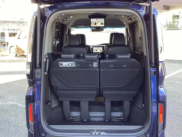 ホンダ ステップワゴン スパーダ eHEV G EXホンダS 大阪府 2021(令3)年 6.2万km 紺 ワンオーナー/純正10インチインターナビ・フルセグTV・CD・/　　　DVD・Bluetooth・HDMI・USB・SD/純正フリップダウンモニター/両側パワースライドドア/純正ドライブレコーダー/ホンダセンシング/スマートキー/バックカメラ/わくわくゲート/ビルトインETC2.0/前席シートヒーター/LEDフォグランプ/LEDオートヘッドライト/電動パーキングブレーキ/電動格納ウインカーミラー/コンフォートビューパッケージ/純正16インチアルミホイール/R4.5.6.7年ディーラー点検記録簿有