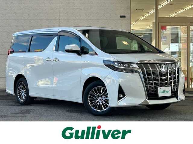 トヨタ アルファードハイブリット 兵庫県 2021(令3)年 1.3万km パール メーカーナビ（CD/DVD/BT/USB/HDMI/SD）/フルセグTV/バックカメラ/全周囲/ETC2.0/サンルーフ/プレミアムサウンド/フリップダウンモニター/両側パワースライドドア/衝突軽減ブレーキ/クルーズコントロール/前後コーナーセンサー/前方ドライブレコーダー/レザーシート/シートヒーター/エアーシート/パワーシート/LEDヘッドライト/オートライト/オートハイビーム/電動リアゲート/オートホールド/電動パーキングブレーキ/スマートキー/AC100V/電動格納ミラー/純正フロアマット/純正ドアバイザー/純正アルミ17インチ
