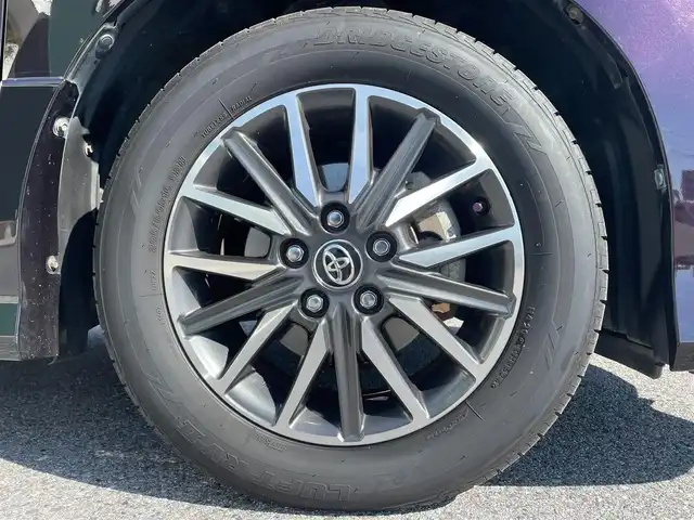 トヨタ ノア Si 滋賀県 2014(平26)年 6.6万km ボルドーマイカメタリック フリップダウンモニター/ツインムーンルーフ/両側パワースライドドア/7インチ純正ナビ【NSZN-W64T】/(FM/AM/CD/DVD/フルセグ/Bluetooth/HDMI)/ETC/バックカメラ/電動格納ミラー/アイドリングストップ/革巻きステアリング/ステアリングスイッチ/オートライト/キセノンライト/フロントフォグ/フルオートエアコン/プッシュスタート/スマートキー/純正フロアマット/ドアバイザー