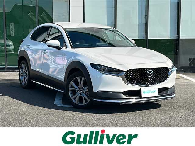 マツダ ＣＸ－３０ XD プロアクティブ 岐阜県 2022(令4)年 1.6万km スノーフレイクホワイトパールマイカ 登録時走行距離15638km/純正10.25型ナビ（DVD/CD/Blue tooth/USB入力端子/HDMI入力端子）/ヘッドアップディスプレイ/フルセグTV/全方位カメラ/ビルトインETC/衝突被害軽減システム/電子制御制動力配分システム（EBD）/ブレーキアシスト/エマージェンシー・シグナル・システム/スマート・ブレーキ・サポート（SBS）/車線逸脱警報システム/AT誤発進抑制制御/ブラインドスポットモニター/コーナーセンサー前後/レーダークルーズコントロール/ドライブレコーダー前方/レーンキープアシスト/LEDヘッドライト/フォグランプ/オートライト/横滑り防止装置/盗難防止装置/SRSエアバッグシステム運転席・助手席+サイド/布系シート/フルフラットシート/純正フロアマット/電動リアゲート/ステアリングスイッチ/パドルシフト/オートエアコン/オートワイパー/オートホールド/純正18アルミホイール/純正アンダーエアロ/プッシュスタート/スマートキー/スペアキー1本/禁煙車