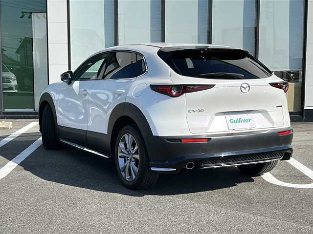 マツダ ＣＸ－３０ XD プロアクティブ 岐阜県 2022(令4)年 1.6万km スノーフレイクホワイトパールマイカ 登録時走行距離15638km/純正10.25型ナビ（DVD/CD/Blue tooth/USB入力端子/HDMI入力端子）/ヘッドアップディスプレイ/フルセグTV/全方位カメラ/ビルトインETC/衝突被害軽減システム/電子制御制動力配分システム（EBD）/ブレーキアシスト/エマージェンシー・シグナル・システム/スマート・ブレーキ・サポート（SBS）/車線逸脱警報システム/AT誤発進抑制制御/ブラインドスポットモニター/コーナーセンサー前後/レーダークルーズコントロール/ドライブレコーダー前方/レーンキープアシスト/LEDヘッドライト/フォグランプ/オートライト/横滑り防止装置/盗難防止装置/SRSエアバッグシステム運転席・助手席+サイド/布系シート/フルフラットシート/純正フロアマット/電動リアゲート/ステアリングスイッチ/パドルシフト/オートエアコン/オートワイパー/オートホールド/純正18アルミホイール/純正アンダーエアロ/プッシュスタート/スマートキー/スペアキー1本/禁煙車