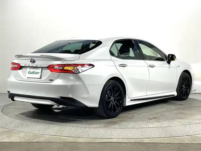 トヨタ カムリ G レザーパッケージ 大阪府 2019(令1)年 3万km プラチナホワイトパールマイカ 純正８ｉｎｃナビ　ＴＲＤエアロ　衝突軽減　レーンアシスト　クリアランスソナー　ＢＳＭ　オートハイビーム　ＥＴＣ　ドラレコ　シートヒーター　バックカメラ　　レーダークルコン　プッシュスタート