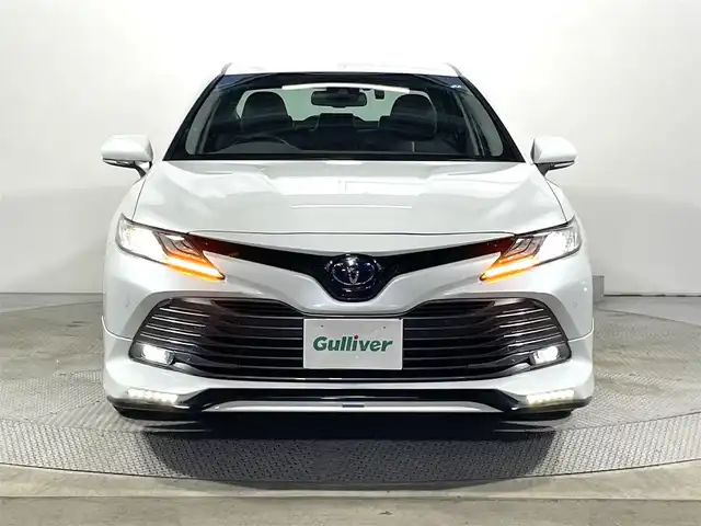 トヨタ カムリ G レザーパッケージ 大阪府 2019(令1)年 3万km プラチナホワイトパールマイカ 純正８ｉｎｃナビ　ＴＲＤエアロ　衝突軽減　レーンアシスト　クリアランスソナー　ＢＳＭ　オートハイビーム　ＥＴＣ　ドラレコ　シートヒーター　バックカメラ　　レーダークルコン　プッシュスタート