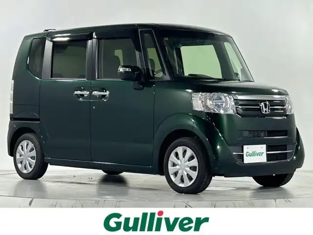 ホンダ Ｎ ＢＯＸ G Lパッケージ 佐賀県 2016(平28)年 1.3万km ブリティッシュグリーンP 純正7インチナビ/CD/DVD/フルセグTV/Bluetooth/片側パワースライドドア/横滑り防止/ビルトインETC/サンシェード/電動格納ミラー/スマートキー/スペアキー/純正フロアマット/シートバックテーブル/ドアバイザー