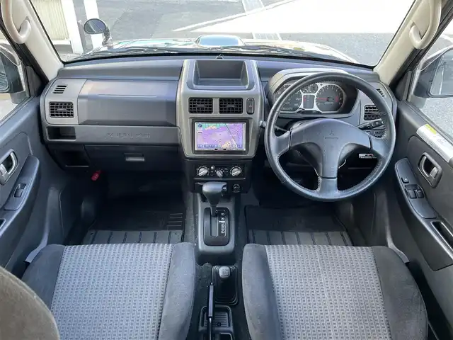 三菱 パジェロ ミニ VR－S 東京都 2007(平19)年 5.3万km 黒 社外ナビ/フルセグTV/バックカメラ/Bluetooth/FM/AM/iPod/純正フロアマット/ETC/専用レカロシート/純正サイドバイザー/革巻きステアリング/ルーフレール