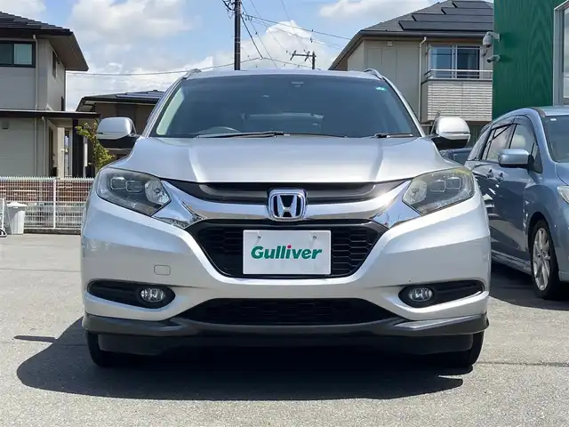 ホンダ ヴェゼル ハイブリッド X 静岡県 2014(平26)年 7.2万km アラバスターシルバーメタリック エンジンスタートボタン/スマートキー/アイドリングストップ/保証書/取扱説明書/記録簿/パワーステアリング/パワーウィンドウ/MTモード付AT/寒冷地仕様/オートエアコン/クルーズコントロール/USB入力端子/ETC/バックカメラ/純正ナビ（CD.DVD.BT.ワンセグ）/純正フロアマット/純正アルミホイール/D席N席シートヒーター/ルーフレール/ABS/横滑り防止装置/オートライト/W+サイドエアバック/衝突軽減システム/カーテンエアバック/Ｈｏｎｄａインターナビ＋リンクアップフリー＋ＥＴＣ車載器/あんしんパッケージ/コンフォートビューパッケージ/フルオートエアコンディショナー