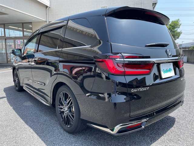 ホンダ オデッセイ ハイブリッド e:HEVアブソルート EX 茨城県 2021(令3)年 7.3万km プレミアムスパークルブラックパール ワンオーナー/純正10インチナビ（CD/DVD/BT/フルセグTV）/ETC2.0/純正フリップダウンモニター/純正エンジンスターター/前後ドライブレコーダー/アラウンドビューモニター/パワーバックドア/両側パワースライドドア/衝突軽減ブレーキ/車線逸脱/ブラインドスポットモニター/パーキングアシスト/レーダークルーズコントロール/プッシュスタート/D/N席シートヒーター/ステアリングスイッチ/LEDヘッドライト/純正フロアマット/バイザー