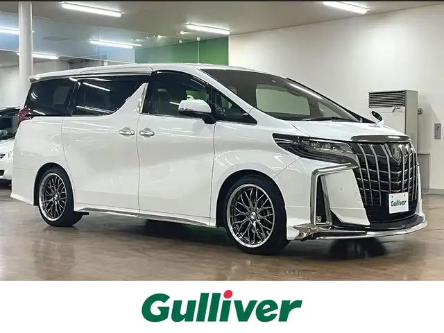トヨタ アルファードハイブリット S タイプゴールドⅢ 道央・札幌 2022(令4)年 4.8万km ホワイトパールクリスタルシャイン 4WD/ワンオーナー/フロントモデリスタエアロ/社外20インチAW/RSR車高調/Wサンルーフ/純正ナビ/・フルセグTV/CD/DVD/BT/USB/TVキャンセラー/純正フリップダウンモニター/バックカメラ/社外ミラー一体型ドライブレコーダー/両側パワースライドドア/ハーフレザーシート/パワーバックドア/レーダークルーズコントロール/ビルトインETC2.0/ブラインドスポットモニター/トヨタセーフティセンス/・プリクラッシュセーフティ/・レーンディパーチャーアラート/・ロードサインアシスト/・先行車発進遅れ機能/横滑り防止装置/前後コーナーセンサー/電動パーキングアシスト/ブレーキホールド/オートライト/オートハイビーム/LEDヘッドライト/フォグライト/AC100V電源/ウインカーミラー/純正フロアマット/純正ドアバイザー/サイド、カーテンエアバッグ/2列目オットマン/ステアリングリモコン/プッシュスタート/スマートキー/新車時保証書/取扱説明書