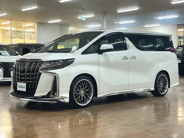 トヨタ アルファードハイブリット S タイプゴールドⅢ 道央・札幌 2022(令4)年 4.8万km ホワイトパールクリスタルシャイン 4WD/ワンオーナー/フロントモデリスタエアロ/社外20インチAW/RSR車高調/Wサンルーフ/純正ナビ/・フルセグTV/CD/DVD/BT/USB/TVキャンセラー/純正フリップダウンモニター/バックカメラ/社外ミラー一体型ドライブレコーダー/両側パワースライドドア/ハーフレザーシート/パワーバックドア/レーダークルーズコントロール/ビルトインETC2.0/ブラインドスポットモニター/トヨタセーフティセンス/・プリクラッシュセーフティ/・レーンディパーチャーアラート/・ロードサインアシスト/・先行車発進遅れ機能/横滑り防止装置/前後コーナーセンサー/電動パーキングアシスト/ブレーキホールド/オートライト/オートハイビーム/LEDヘッドライト/フォグライト/AC100V電源/ウインカーミラー/純正フロアマット/純正ドアバイザー/サイド、カーテンエアバッグ/2列目オットマン/ステアリングリモコン/プッシュスタート/スマートキー/新車時保証書/取扱説明書