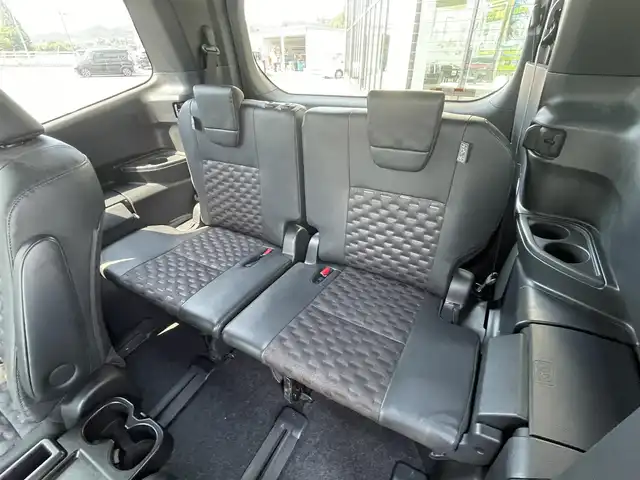 トヨタ ヴォクシー S－Z 愛媛県 2022(令4)年 2.5万km アティチュードブラックマイカ 10.5インチディスプレイオーディオ/（Bluetooth/CD/DVD/HDMI/AppleCarPlay/AndroidAuto/フルセグTV)/14型フリップダウンモニター/バックカメラ/両側パワースライドドア/ビルドインETC2.0/シートヒーター/アダプティブクルーズコントロール/純正17インチアルミホイール/LEDヘッドライト/オートマチックハイビーム/パーキングセンサー/プリクラッシュセーフティー/横滑り防止装置/レーンキープアシスト/盗難防止装置/スペアキー1本/プッシュスタート/スマートキー