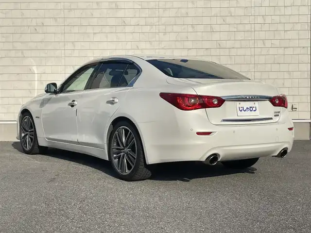 日産 スカイライン ハイブリッド 350GT Type SP 栃木県 2014(平26)年 12.7万km クリスタルホワイトパール 株)IDOMが運営する【じしゃロン小山店】の自社ローン専用車両になります。こちらは現金またはオートローンご利用時の価格です。自社ローンご希望の方は別途その旨お申付け下さい//純正フルセグナビ/（CD/DVD/AM/FMラジオ）/(Bluetooth)/スマートキー/プッシュスタート/バックカメラ/オールアラウンドビュー/ＥＴＣ/インテリジェンスクルーズコントロール/レーンキープアシスト/車線逸脱警報/ドライブレコーダー/コーナーセンサー/パワーシート/シートヒーター/ステアリングリモコン/TPMS/ＢＯＳＥサウンドシステム/電動格納ドアミラー/パワーウインドウ/防眩ミラー/オートライト