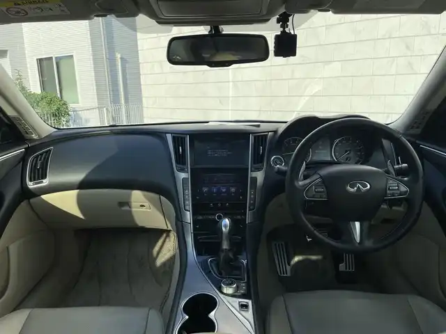 日産 スカイライン ハイブリッド 350GT Type SP 栃木県 2014(平26)年 12.7万km クリスタルホワイトパール 株)IDOMが運営する【じしゃロン小山店】の自社ローン専用車両になります。こちらは現金またはオートローンご利用時の価格です。自社ローンご希望の方は別途その旨お申付け下さい//純正フルセグナビ/（CD/DVD/AM/FMラジオ）/(Bluetooth)/スマートキー/プッシュスタート/バックカメラ/オールアラウンドビュー/ＥＴＣ/インテリジェンスクルーズコントロール/レーンキープアシスト/車線逸脱警報/ドライブレコーダー/コーナーセンサー/パワーシート/シートヒーター/ステアリングリモコン/TPMS/ＢＯＳＥサウンドシステム/電動格納ドアミラー/パワーウインドウ/防眩ミラー/オートライト