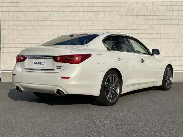 日産 スカイライン ハイブリッド 350GT Type SP 栃木県 2014(平26)年 12.7万km クリスタルホワイトパール 株)IDOMが運営する【じしゃロン小山店】の自社ローン専用車両になります。こちらは現金またはオートローンご利用時の価格です。自社ローンご希望の方は別途その旨お申付け下さい//純正フルセグナビ/（CD/DVD/AM/FMラジオ）/(Bluetooth)/スマートキー/プッシュスタート/バックカメラ/オールアラウンドビュー/ＥＴＣ/インテリジェンスクルーズコントロール/レーンキープアシスト/車線逸脱警報/ドライブレコーダー/コーナーセンサー/パワーシート/シートヒーター/ステアリングリモコン/TPMS/ＢＯＳＥサウンドシステム/電動格納ドアミラー/パワーウインドウ/防眩ミラー/オートライト