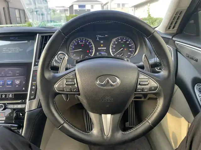 日産 スカイライン ハイブリッド 350GT Type SP 栃木県 2014(平26)年 12.7万km クリスタルホワイトパール 株)IDOMが運営する【じしゃロン小山店】の自社ローン専用車両になります。こちらは現金またはオートローンご利用時の価格です。自社ローンご希望の方は別途その旨お申付け下さい//純正フルセグナビ/（CD/DVD/AM/FMラジオ）/(Bluetooth)/スマートキー/プッシュスタート/バックカメラ/オールアラウンドビュー/ＥＴＣ/インテリジェンスクルーズコントロール/レーンキープアシスト/車線逸脱警報/ドライブレコーダー/コーナーセンサー/パワーシート/シートヒーター/ステアリングリモコン/TPMS/ＢＯＳＥサウンドシステム/電動格納ドアミラー/パワーウインドウ/防眩ミラー/オートライト