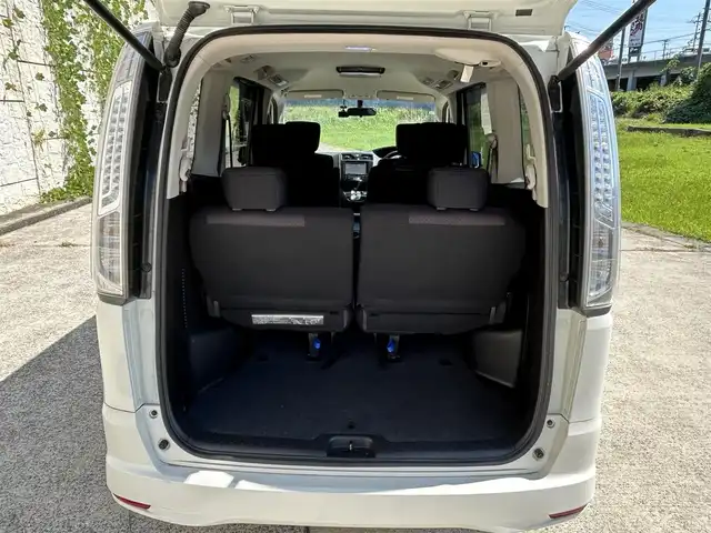 日産 セレナ ハイウェイS G Sハイブリッド 長崎県 2012(平24)年 9.7万km ブリリアントホワイトパール 社外HDDナビ/（CD/DVD/BT/フルセグ）/バックカメラ/フリップダウンモニター/両側パワースライドドア/クルーズコントロール/ETC/オートライト/フォグランプ/電動格納ミラー/スマートキー/プッシュスタート/純正16インチAW