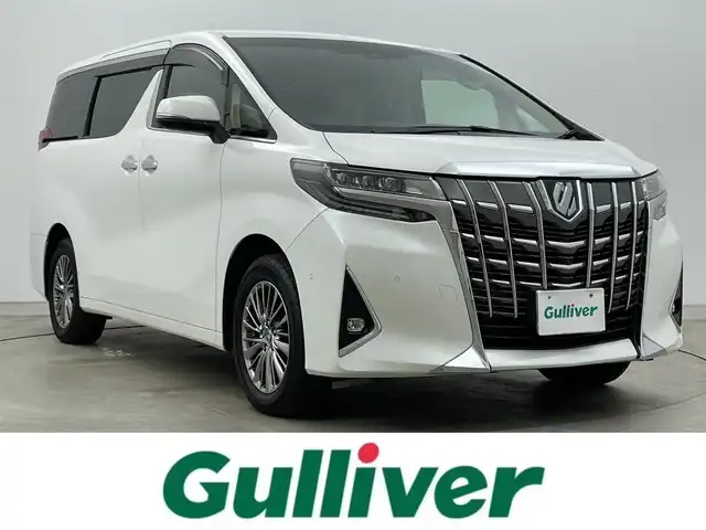 トヨタ アルファードハイブリット エグゼクティブ ラウンジ 岡山県 2021(令3)年 4.5万km ホワイトパールクリスタルシャイン 10.5型純正SDナビ/（BTオーディオ/フルセグ）/JBLサウンドシステム/デジタルインナーミラー/パノラミックビューモニター/12.3インチフリップダウンモニター/ホワイトレザーシート/前席パワーシート/快適温熱シート/2列目エグゼクティブラウンジシート/・パワーリクライニング/・パワーオットマン/・快適温熱シート/ETC2.0/ドライブレコーダー/セーフティセンス/・プリクラッシュセーフティ/・レーントレーシングアシスト/・レーダークルーズコントロール/・BSM/パワーバックドア/両側パワースライドドア/ステアリングヒーター/純正フロアマット