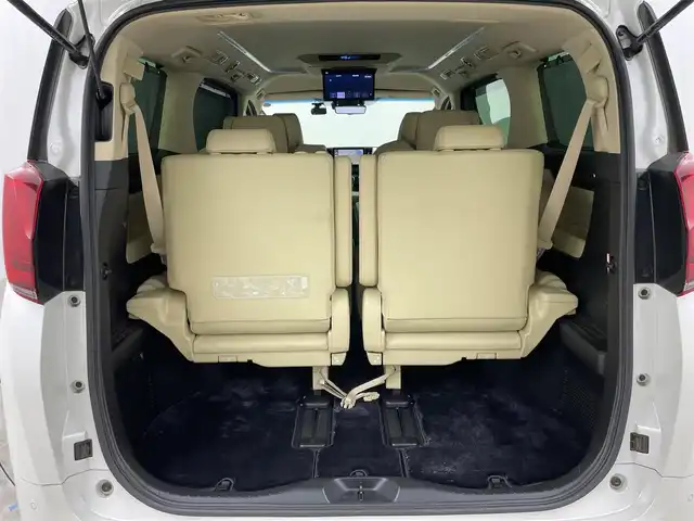 トヨタ アルファードハイブリット エグゼクティブ ラウンジ 岡山県 2021(令3)年 4.5万km ホワイトパールクリスタルシャイン 10.5型純正SDナビ/（BTオーディオ/フルセグ）/JBLサウンドシステム/デジタルインナーミラー/パノラミックビューモニター/12.3インチフリップダウンモニター/ホワイトレザーシート/前席パワーシート/快適温熱シート/2列目エグゼクティブラウンジシート/・パワーリクライニング/・パワーオットマン/・快適温熱シート/ETC2.0/ドライブレコーダー/セーフティセンス/・プリクラッシュセーフティ/・レーントレーシングアシスト/・レーダークルーズコントロール/・BSM/パワーバックドア/両側パワースライドドア/ステアリングヒーター/純正フロアマット