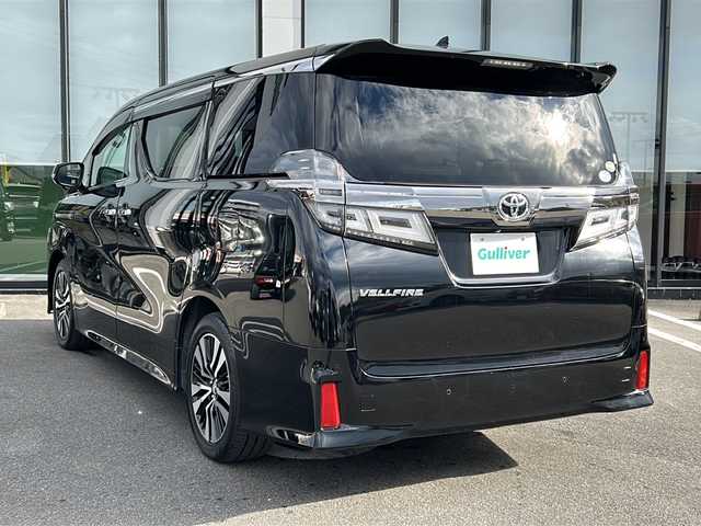 トヨタ ヴェルファイア Z Gエディション 岐阜県 2018(平30)年 8.7万km ブラック 登録時走行距離　86264km/純正１０インチナビ/１２インチフリップダウンモニタ/フルセグ/シートヒーター/エアシート/オットマン/バックカメラ/パワーバックドア/オートマチックハイビーム/ＤＶＤ再生機能/Bluetooth接続/トヨタセーフティセンス/前後コーナーセンサー/ビルトインＥＴＣ/WAC/スマートキー/プッシュスタート/純正18インチAW/レザーシート/社外フロアマット