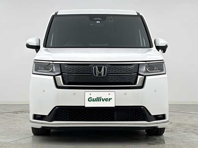 ホンダ ステップワゴン スパーダ eHEV 愛知県 2022(令4)年 3.1万km プラチナホワイトパール Honda SENSING/・衝突軽減ブレーキ/・アダプティブクルーズコントロール/・車線維持支援システム/・ブラインドスポットインフォメーション/・パーキングセンサーシステム/・オートハイビーム/純正11.4インチナビ/・CD.DVD.USB.BT/フルセグTV/バックカメラ/両側パワースライドドア/パワーバックドア/ハーフレザーシート/前席シートヒーター/シーケンシャルランプ/LEDヘッドライト/LEDフォグランプ/パドルシフト/ビルトインETC/純正ドラレコ（F）/横滑り防止/プッシュスタート/スマートキー/純正16インチAW/純正フロアマット/ロールサンシェード/シートバックテーブル/シート背面USB