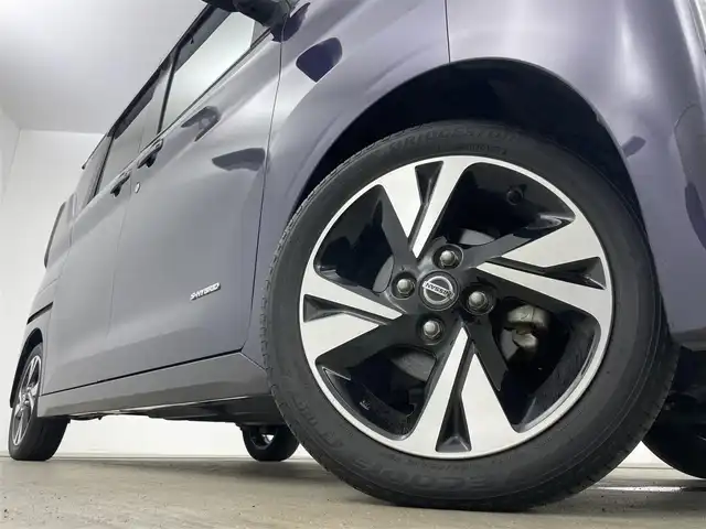 日産 ルークス HWS Gターボ プロパイロットED 岡山県 2021(令3)年 2万km アメジストパープル 純正9インチナビ/【フルセグ/Bluetooth/DVD】/アラウンドビューモニター/純正15inアルミホイール+サマータイヤ：装着/プロパイロット/ビルトインETC/LEDヘッドライト（AUTO機能付き）/リアサーキュレーター/シートバックテーブル/ISOFIX/ハンズフリードア/インテリジェントモビリティ/・インテリジェントエマージェンシーブレーキ/・アダプティブLEDヘッドライトシステム/・踏み間違い衝突防止アシスト/・車線逸脱警報機能/・車線逸脱防止支援システム/・前方衝突予測警報/・ふらつき警報/・先行車発進お知らせ機能/・標識認識機能/(進入禁止、最高速度、一時停止)/・SOSコール