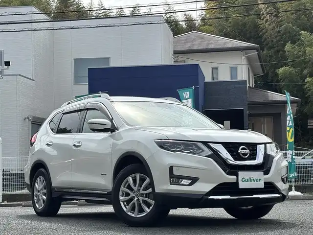 日産 エクストレイル ハイブリッド 20Xi 熊本県 2018(平30)年 3.9万km ブリリアントホワイトパール ワンオーナー/ルーフレール/純正SDナビ/【フルセグTV/CD/DVD】/バックカメラ/アラウンドビューモニター/デジタルインナーミラー/プロパイロットシステム/衝突被害軽減システム/レーダークルーズコントロール/ダウンヒルアシストコントロール/車両接近通報装置/コーナーセンサー/合皮シート/ISOFIX/電動リアゲート/純正17インチアルミホイール/オートLEDライト/オートマチックハイビーム/ビルトインETC/横滑り防止装置/盗難防止装置/純正フロアマット/プッシュスタート/スマートキー/スペアキー/取扱説明書/保証書