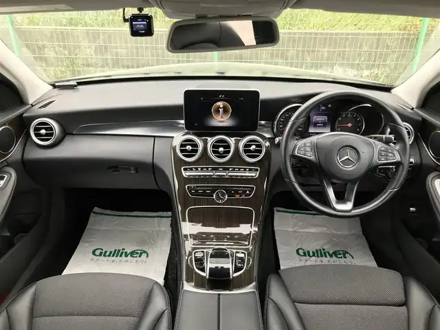 メルセデス・ベンツ Ｃ２００ アバンギャルド 富山県 2015(平27)年 6.6万km オブシディアンブラック 〇COMANDシステム/〇バックカメラ/〇レーダーセーフティパッケージ/〇パークトロニック/〇ヘッドアップディスプレイ/〇シートヒーター（運転席/助手席）/〇パワートランクリッド/〇LEDインテリジェントシステム/〇アダプティブハイビームアシストプラス/〇LEDコーナリングランプ/〇純正17インチAW/〇ブラウン木目調センターパネル/アナログ時計/〇ディンプル加工ナッパ革巻きステアリングホイール/〇無地ファブリック/合皮コンビシート/〇パワーシート（運転席メモリー付/助手席）/〇ETC/〇ドライブレコーダー/〇キーレスゴー