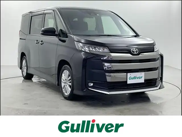 トヨタ ノア S－G 福井県 2022(令4)年 2.4万km アティチュードブラックマイカ 10.5インチメーカー純正ナビ/FM/AM/フルセグTV/Bluetooth/USB/Miracast/後席フリップダウンモニター/快適利便パッケージ/・ハンズフリーデュアルパワースライドドア/・左右独立温度コントロールフロントオートエアコン/・リヤオートエアコン/・ナノイーX/・運転席+助手席シートヒーター/・独立型センターコンソールボックス/トヨタセーフティセンス/・レーンディパーチャーアラート/・プリクラッシュセーフティ/・プロアクティブドライビングアシスト/・パーキングセンサー/・パーキングサポートブレーキ/・標識認識機能/・レーダークルーズコントロール/ＥＴＣ２．０/オートハイビーム/ＬＥＤライト/オートハイビーム/サイドカーテンエアバッグ