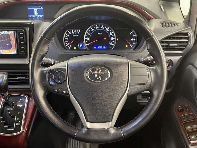 トヨタ ヴォクシー ZS 道央・札幌 2014(平26)年 12.6万km ブラッキッシュアゲハガラスフレーク /純正ナビ(NSZT-W64)//純正オーディオ//エンジンスターター//DVD//CD//Bluetooth接続//衝突被害軽減システム//横滑り防止装置//ETC//アイドリングストップ//寒冷地仕様//MTモード付きAT//社外アルミホイール冬タイヤ積載//片側パワースライドドア//4WD//パワーステアリング//パワーウィンドウ//ABS//純正LEDヘッドライト//エンジンスタートボタン//スマートキー//WAC//純正フロアマット//ウォークスルー//3列シート//ダブルエアバック