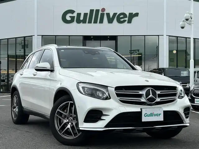 メルセデス・ベンツ ＧＬＣ２２０ d 4マチックスポーツ 本革 長崎県 2017(平29)年 9.6万km ダイヤモンドホワイト ワンオーナー/純正ナビ(FM/AM/ワンセグ/BT/CD/DVD)/革巻きステアリング/ステアリングスイッチ/パドルシフト/ブラックレザーシート/前席パワーシート/全席シートヒーター/ビルトインETC/ドラレコ/サンルーフ/純正フロアマット/Burmesterサウンド/純正19インチアルミホイール/ハンズフリーパワーバックドア/ステアリングアシスト/ABS/レーンキープアシスト/横滑り防止装置/前後コーナーセンサー/衝突被害軽減ブレーキ/オートライト/LEDヘッドライト/ダブル・サイドエアバッグ/カーテンエアバッグ/ISOFIX/取説/保証書/スペアキー
